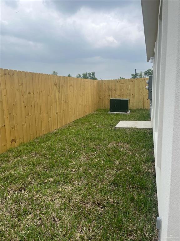 3302 Wolf Creek Avenue, Unit 4 Edinburg, TX 78541 - Photo 11 of 12 a view of a big yard