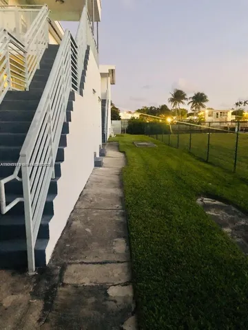 a view of a yard and entertaining space