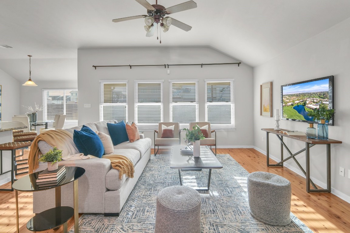 19021 Raglan Castle Path Pflugerville, TX 78660 - Photo 1 of 1 a living room with furniture and a window