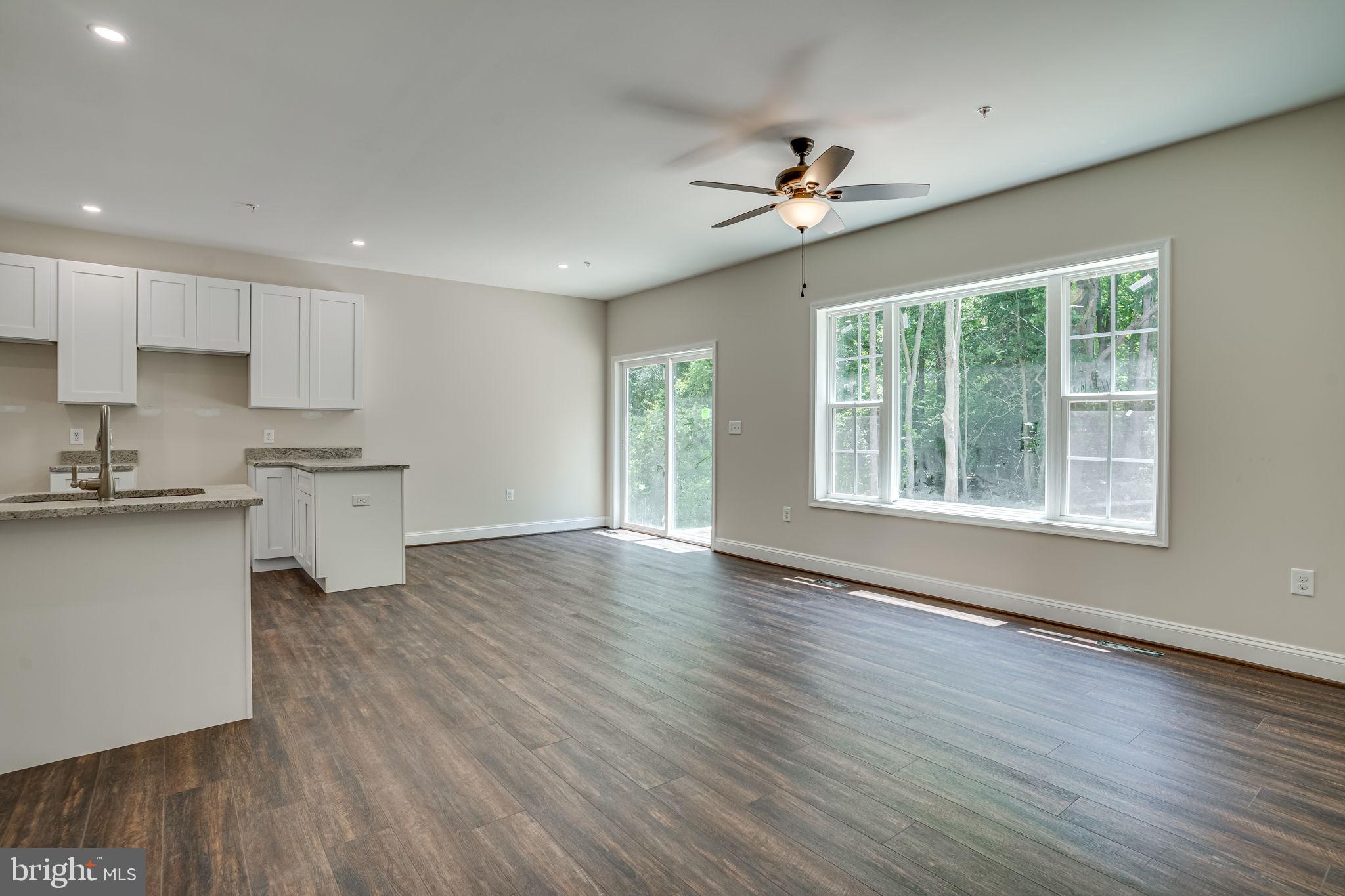 44043 Sandy Bottom Road Hollywood, MD 20636 - Photo 8 of 42 Dining area and walk out to back yard from living