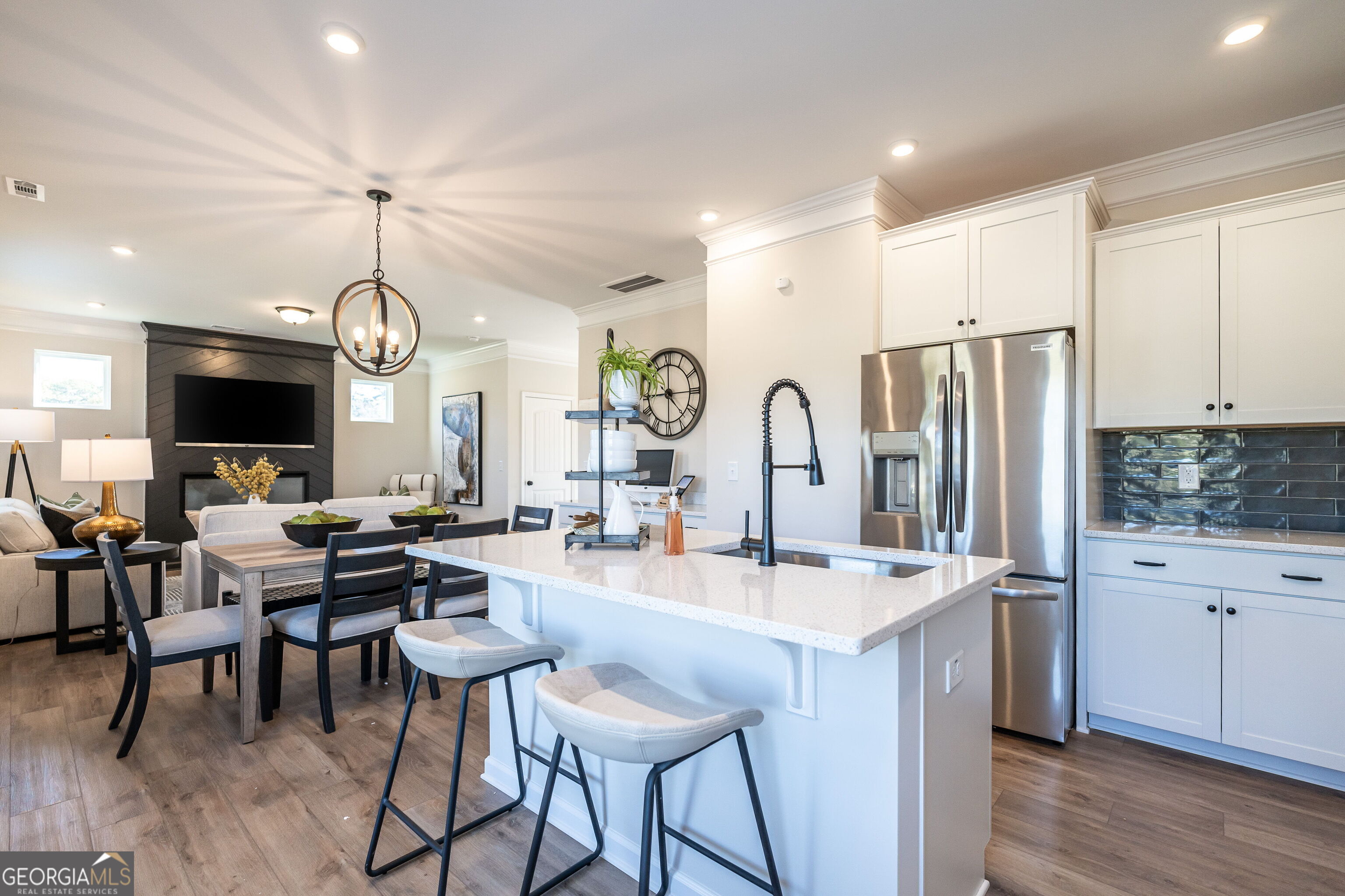10410 Trellis Lane, Unit (LOT 35) Hampton, GA 30228 - Photo 18 of 28 a large kitchen with a table and chairs