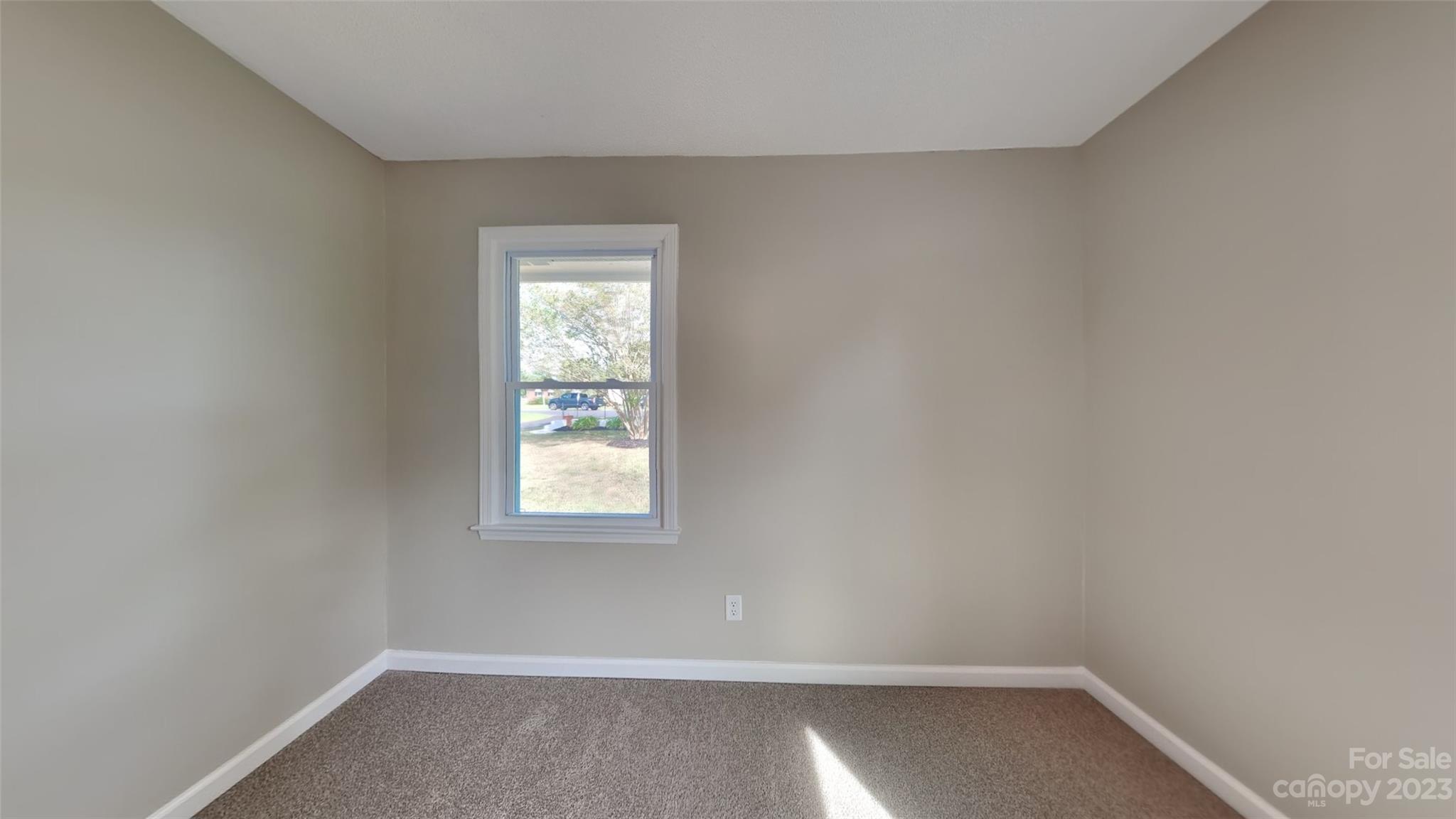 622 Unique Street Chester, SC 29706 - Photo 8 of 12 an empty room with a window