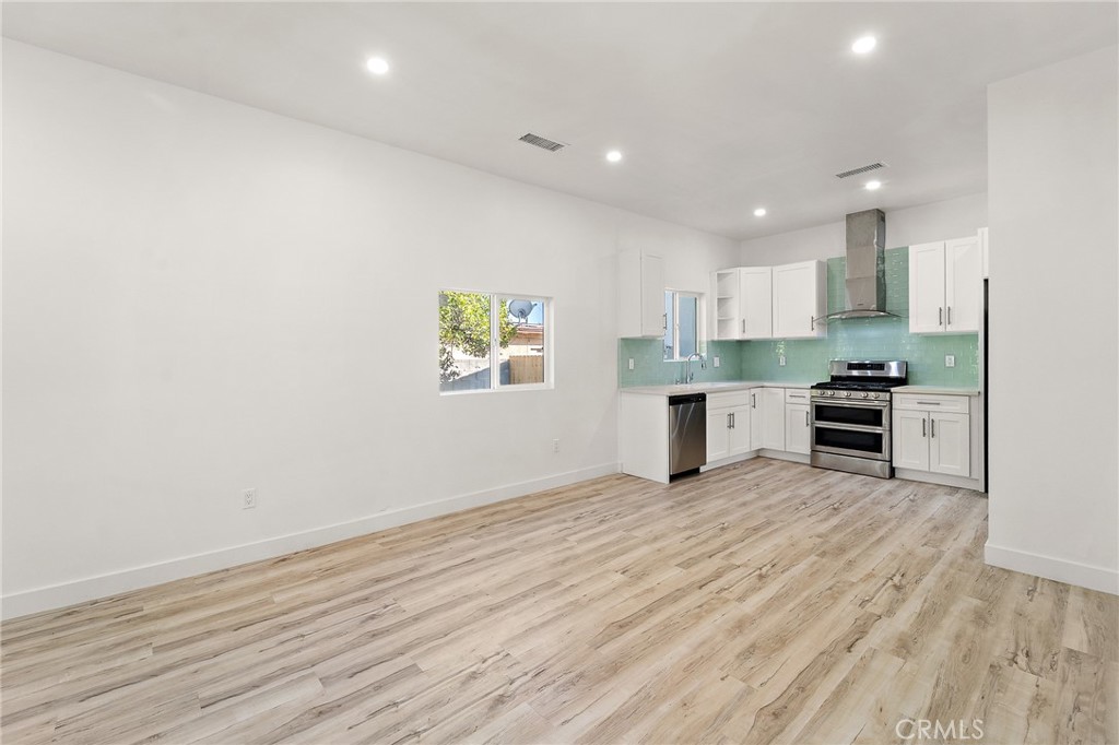 10730 Strathern Street Sun Valley, CA 91352 - Photo 14 of 57 a view of kitchen with microwave and stove