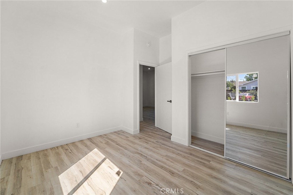 10730 Strathern Street Sun Valley, CA 91352 - Photo 16 of 57 wooden floor in an empty room
