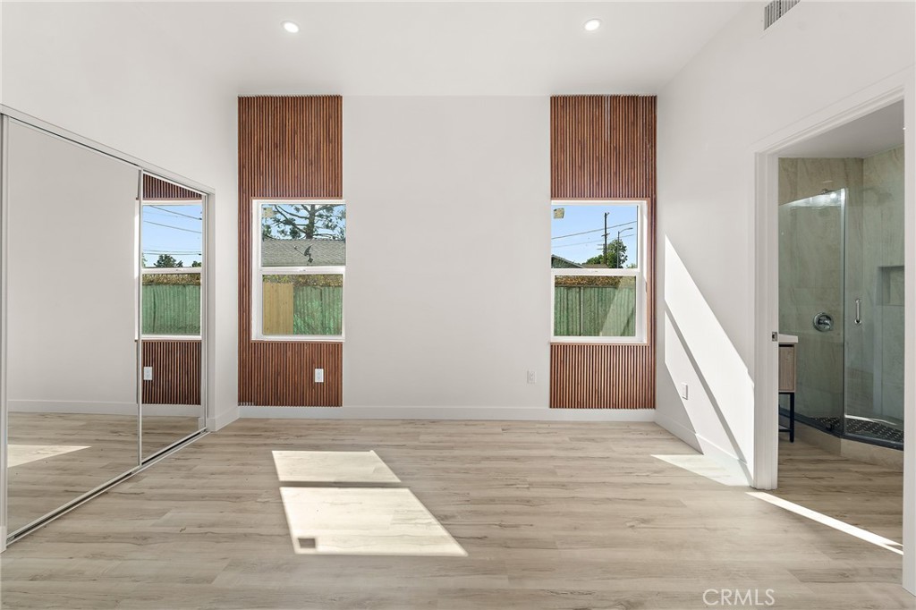 10730 Strathern Street Sun Valley, CA 91352 - Photo 22 of 57 a view of a hallway with windows and entryway