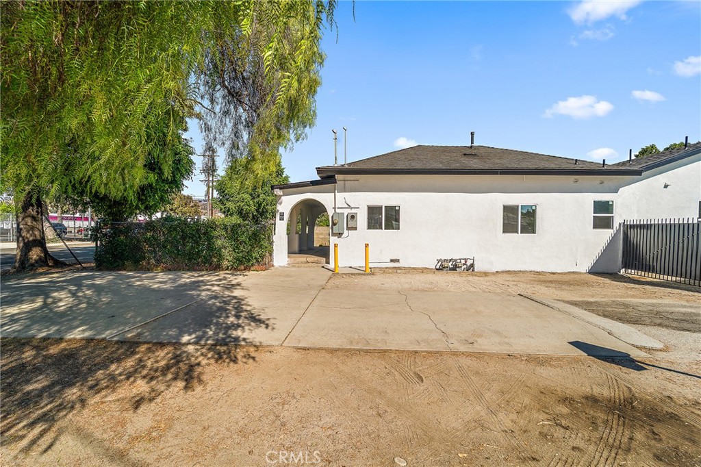 10730 Strathern Street Sun Valley, CA 91352 - Photo 33 of 57 a front view of a house with a yard