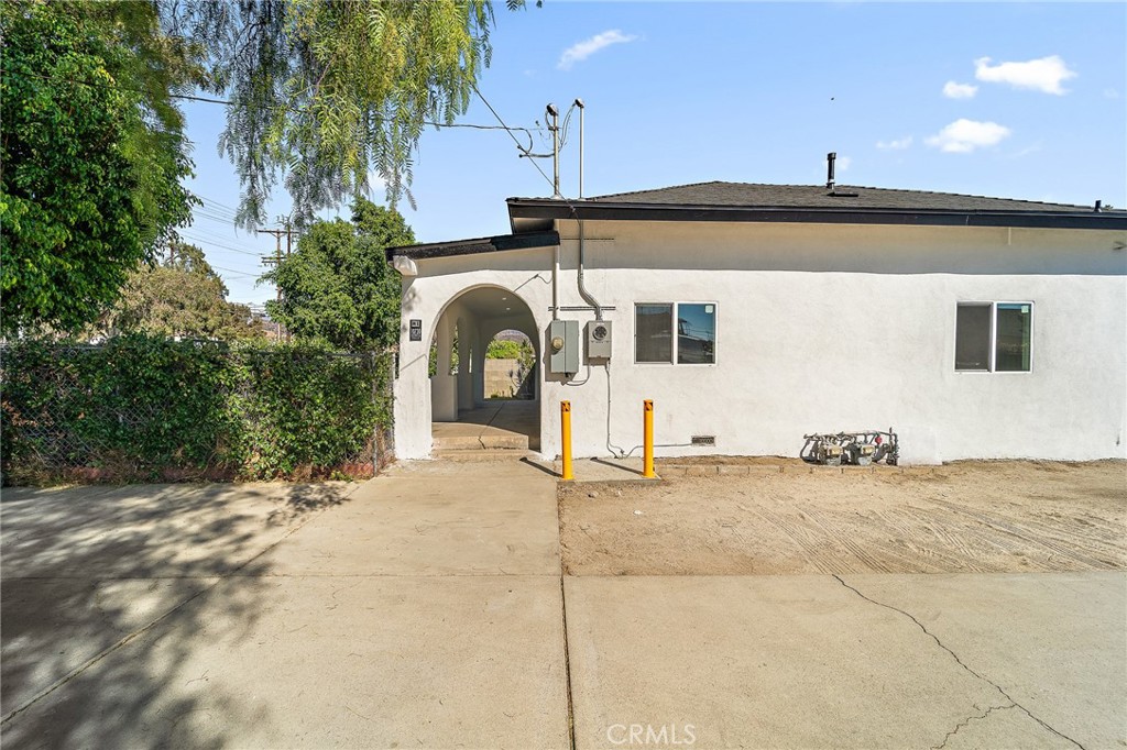 10730 Strathern Street Sun Valley, CA 91352 - Photo 34 of 57 a front view of a house with a yard