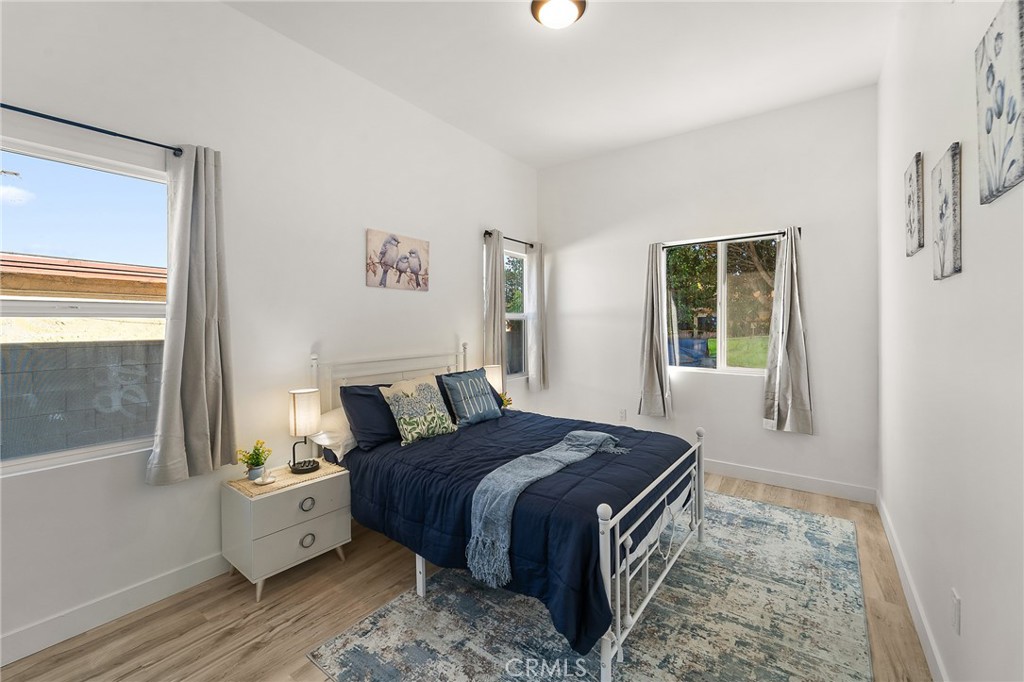 10730 Strathern Street Sun Valley, CA 91352 - Photo 48 of 57 a bedroom with a bed and a window