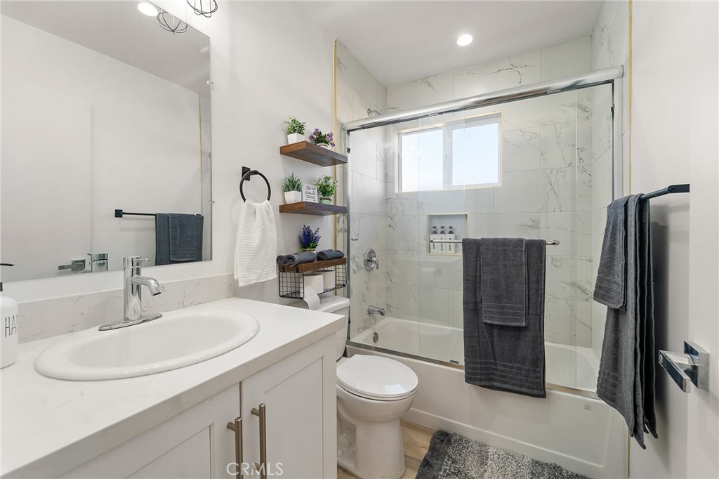 10730 Strathern Street Sun Valley, CA 91352 - Photo 52 of 57 a bathroom with a sink toilet and shower