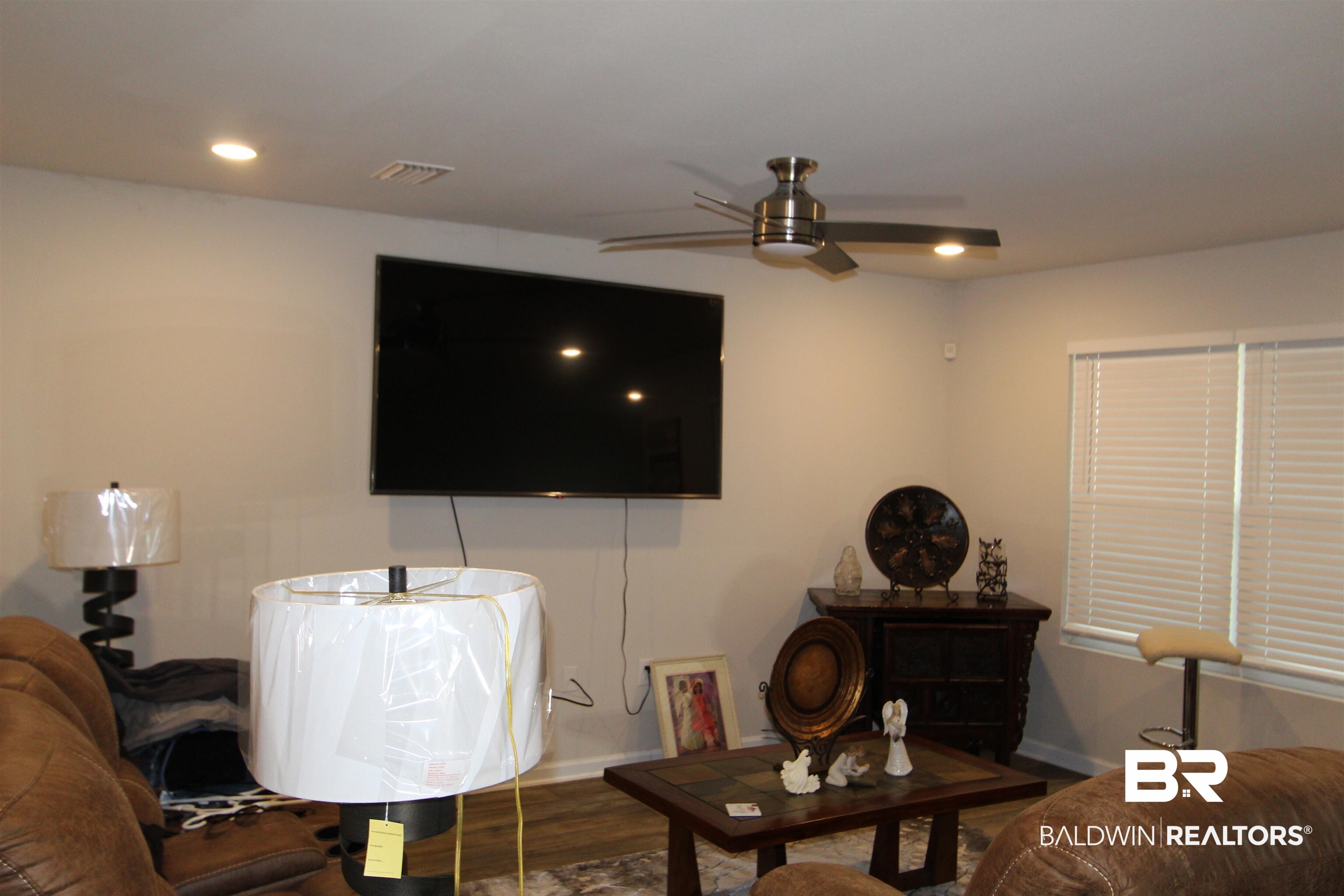 1502 Majesty Loop Foley, AL 36535 - Photo 14 of 26 Living room featuring hardwood / wood-style floors and ceiling fan