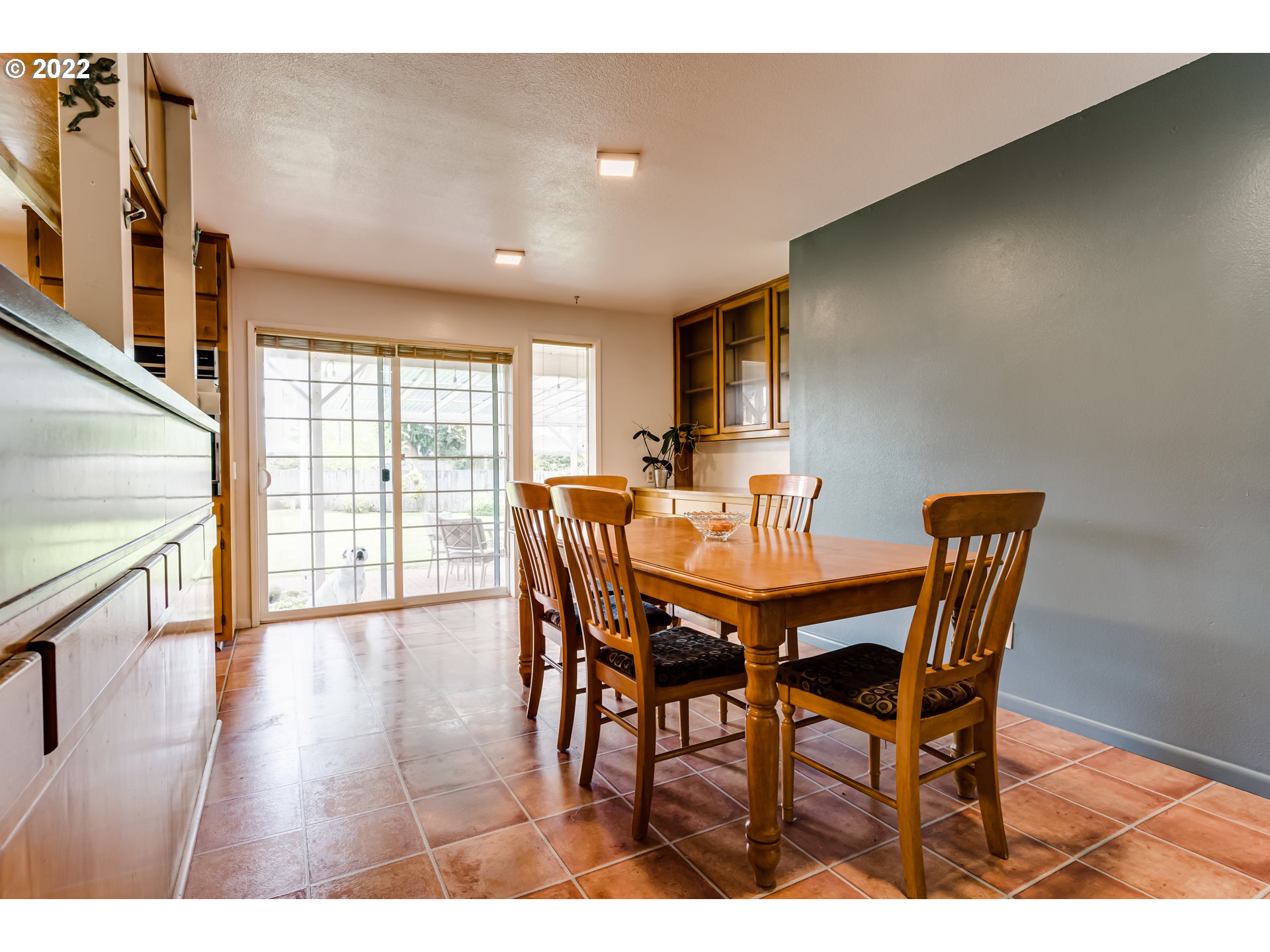 345 Mansfield Street Springfield, OR 97477 - Photo 10 of 31 a view of a dining room with furniture and wooden floor