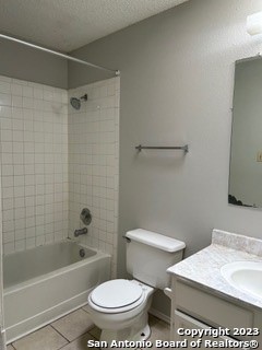 5527 Lochmoor, Unit 1 San Antonio, TX 78244 - Photo 5 of 10 a white toilet sitting next to a bath tub and a shower