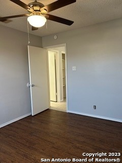 5527 Lochmoor, Unit 1 San Antonio, TX 78244 - Photo 7 of 10 a view of an empty room with wooden floor