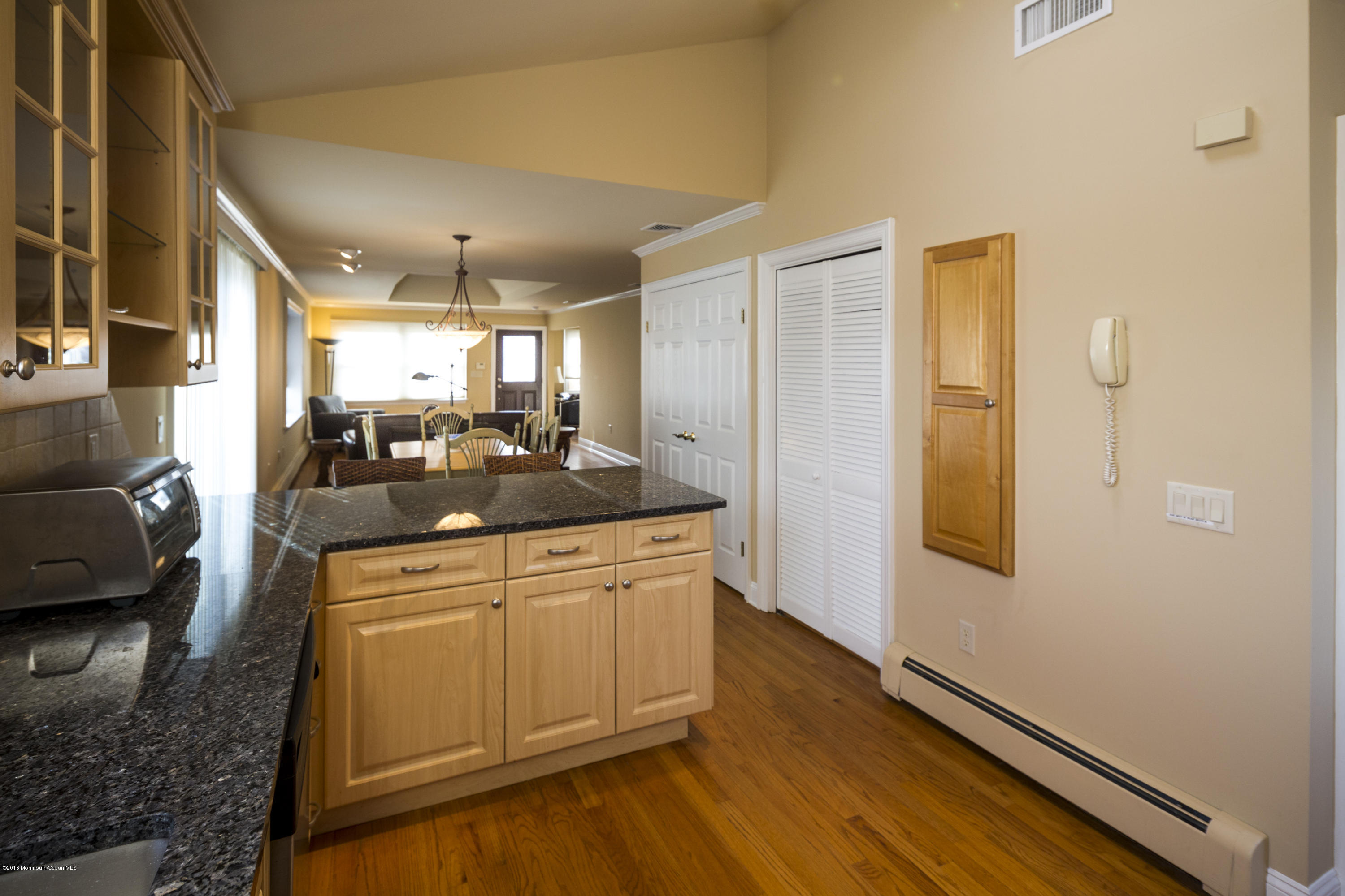 41 White Street Long Branch, NJ 07740 - Photo 13 of 29 a kitchen with stainless steel appliances granite countertop a refrigerator a stove and a wooden floors