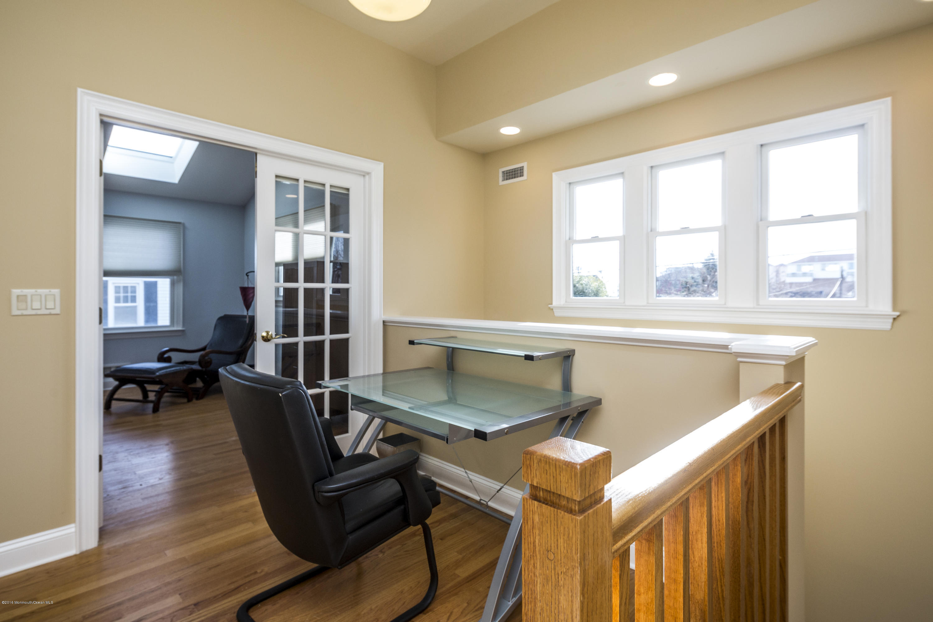 41 White Street Long Branch, NJ 07740 - Photo 23 of 29 a room with furniture and a wooden floor