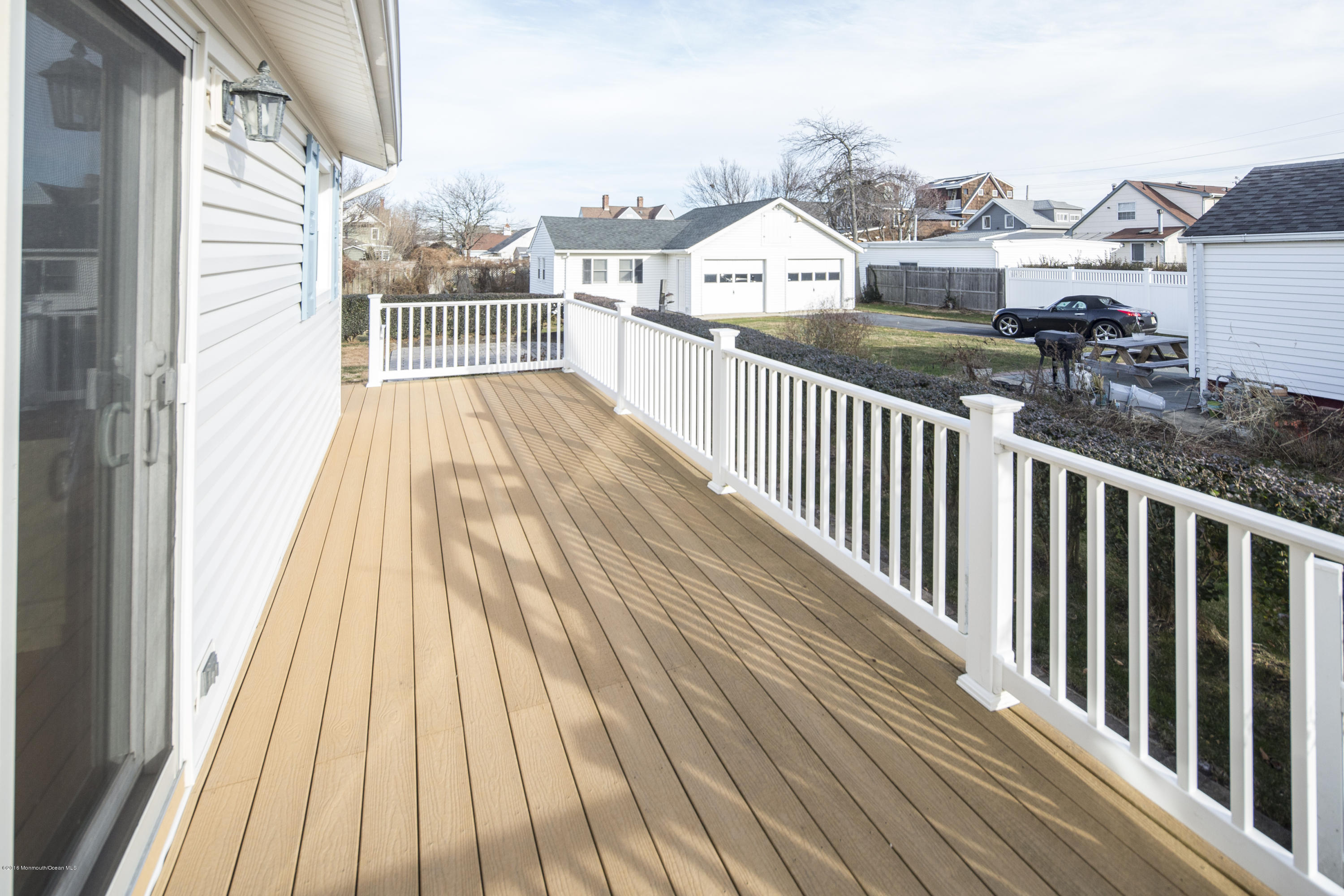 41 White Street Long Branch, NJ 07740 - Photo 26 of 29 a view of a balcony with wooden floor
