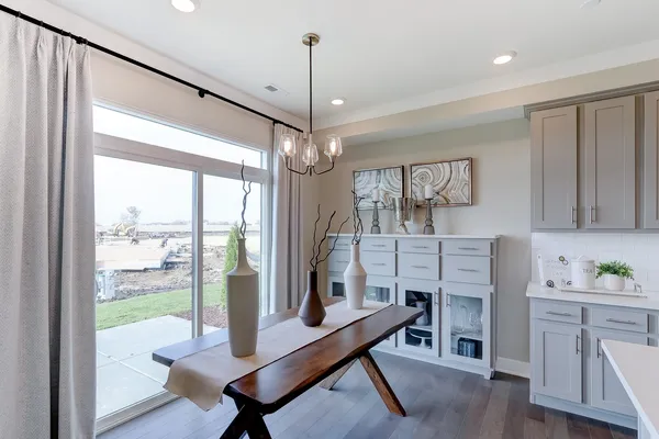 a workspace with furniture window and wooden floor