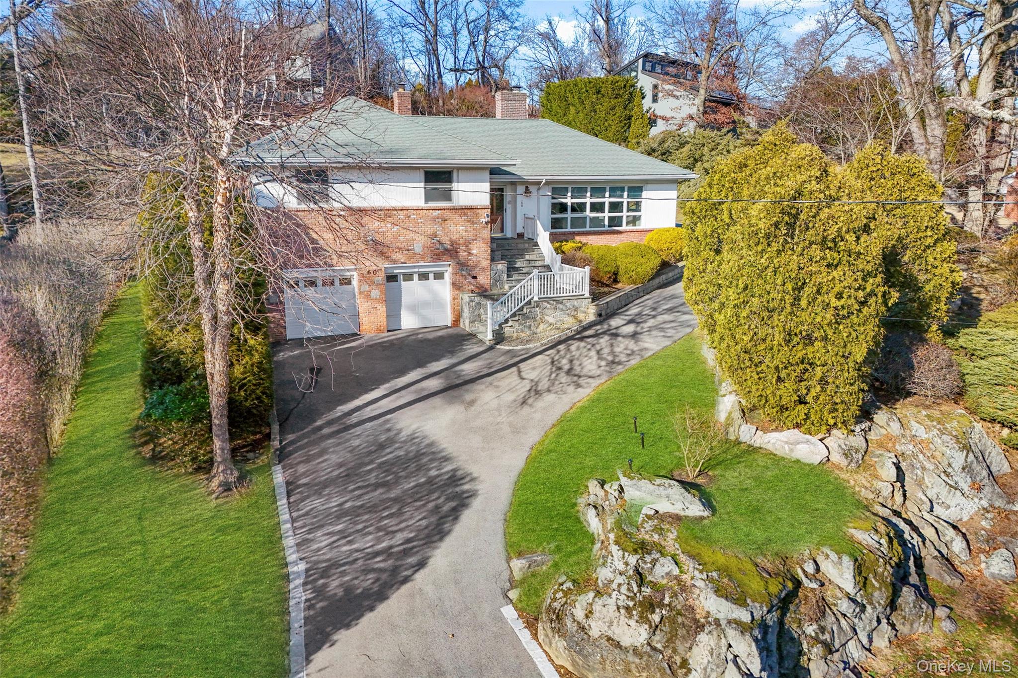 60 Overhill Road New Rochelle, NY 10804 - Photo 1 of 50 a view of a house with a yard