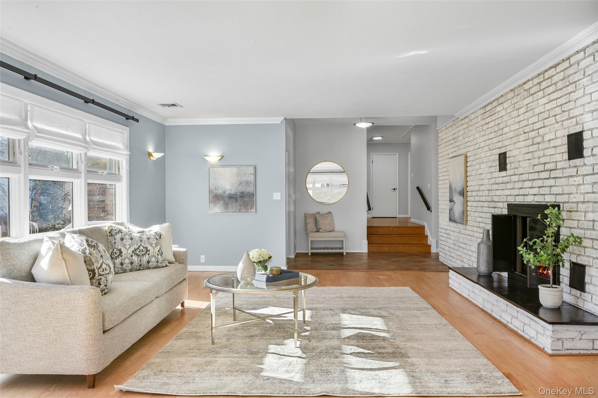 60 Overhill Road New Rochelle, NY 10804 - Photo 13 of 50 a living room with furniture and a fireplace