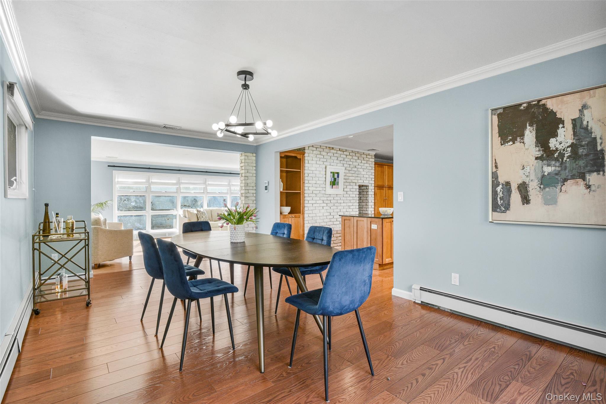 60 Overhill Road New Rochelle, NY 10804 - Photo 15 of 50 a view of a dining room with furniture window and wooden floor