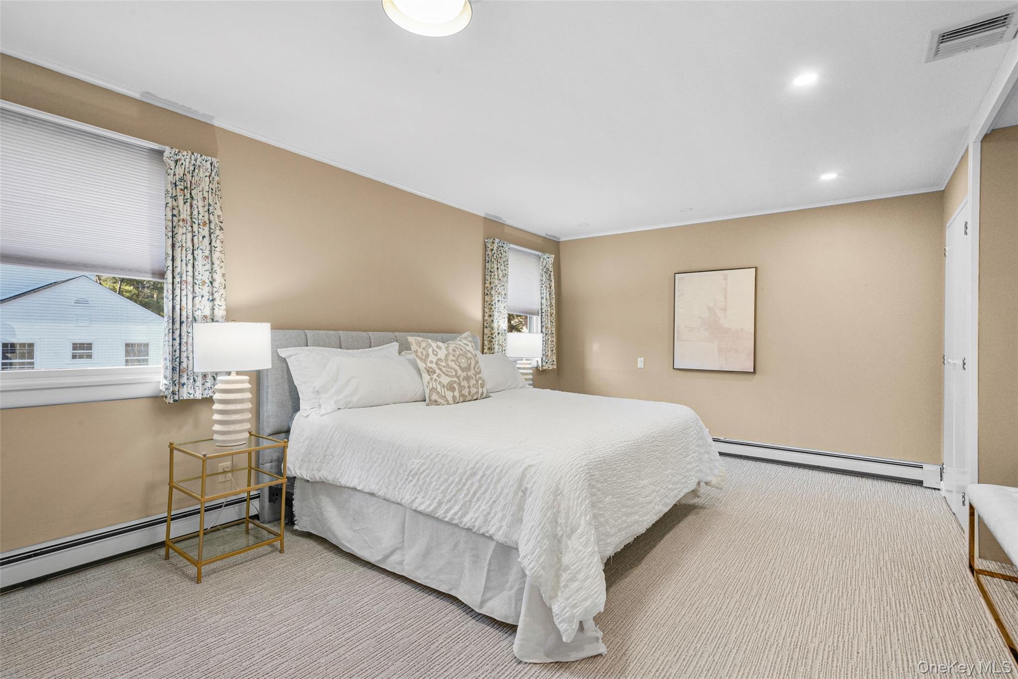 60 Overhill Road New Rochelle, NY 10804 - Photo 23 of 50 a bedroom with a bed and a night stand