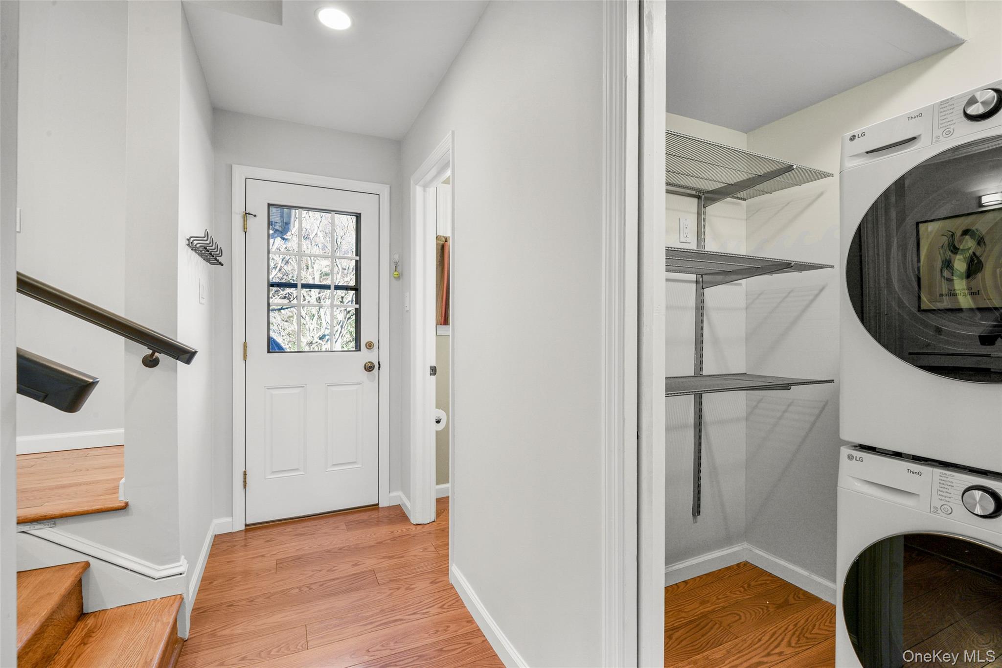 60 Overhill Road New Rochelle, NY 10804 - Photo 36 of 50 a view of a hallway with washer and dryer