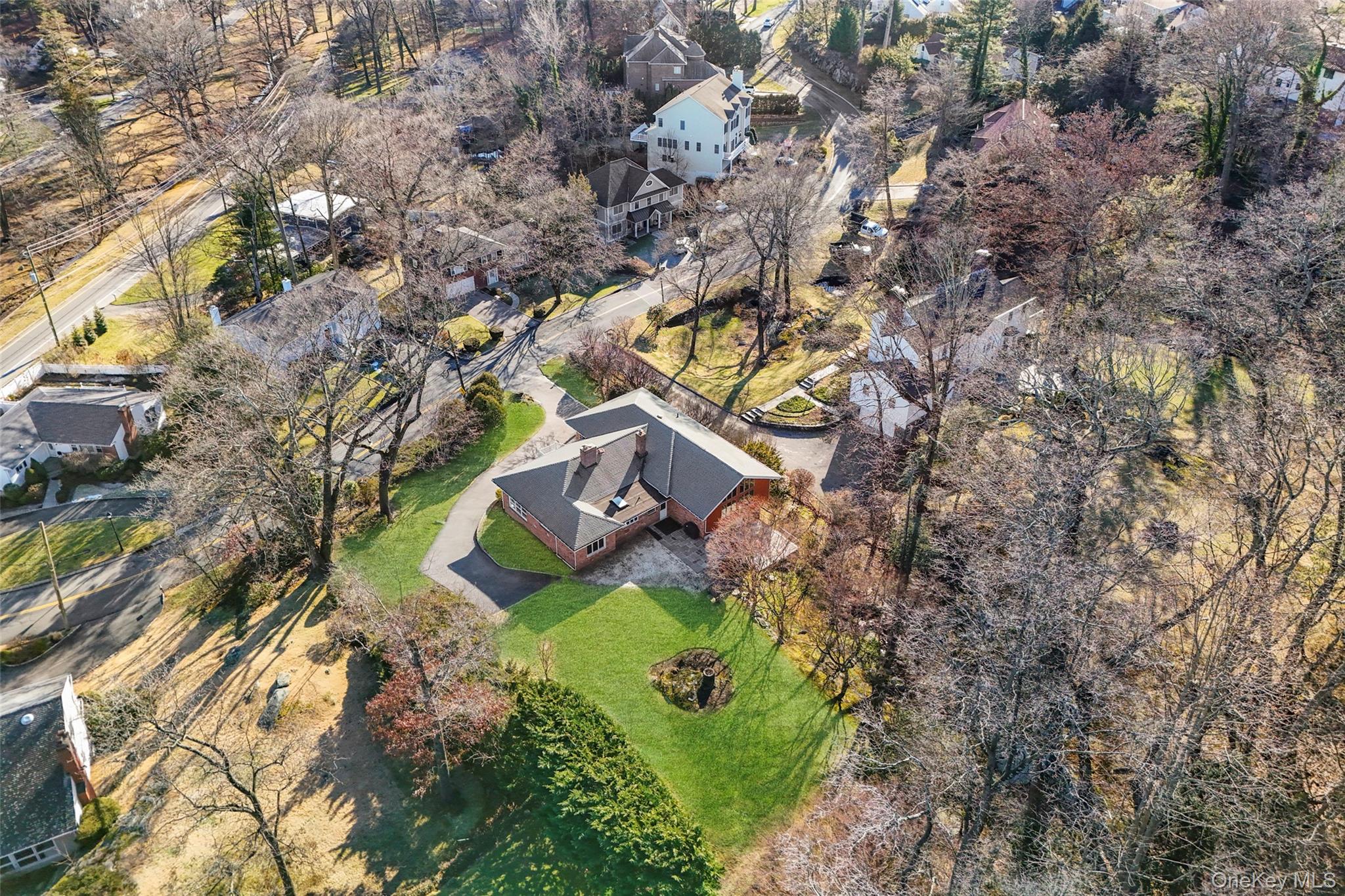 60 Overhill Road New Rochelle, NY 10804 - Photo 42 of 50 an aerial view of a house with a yard