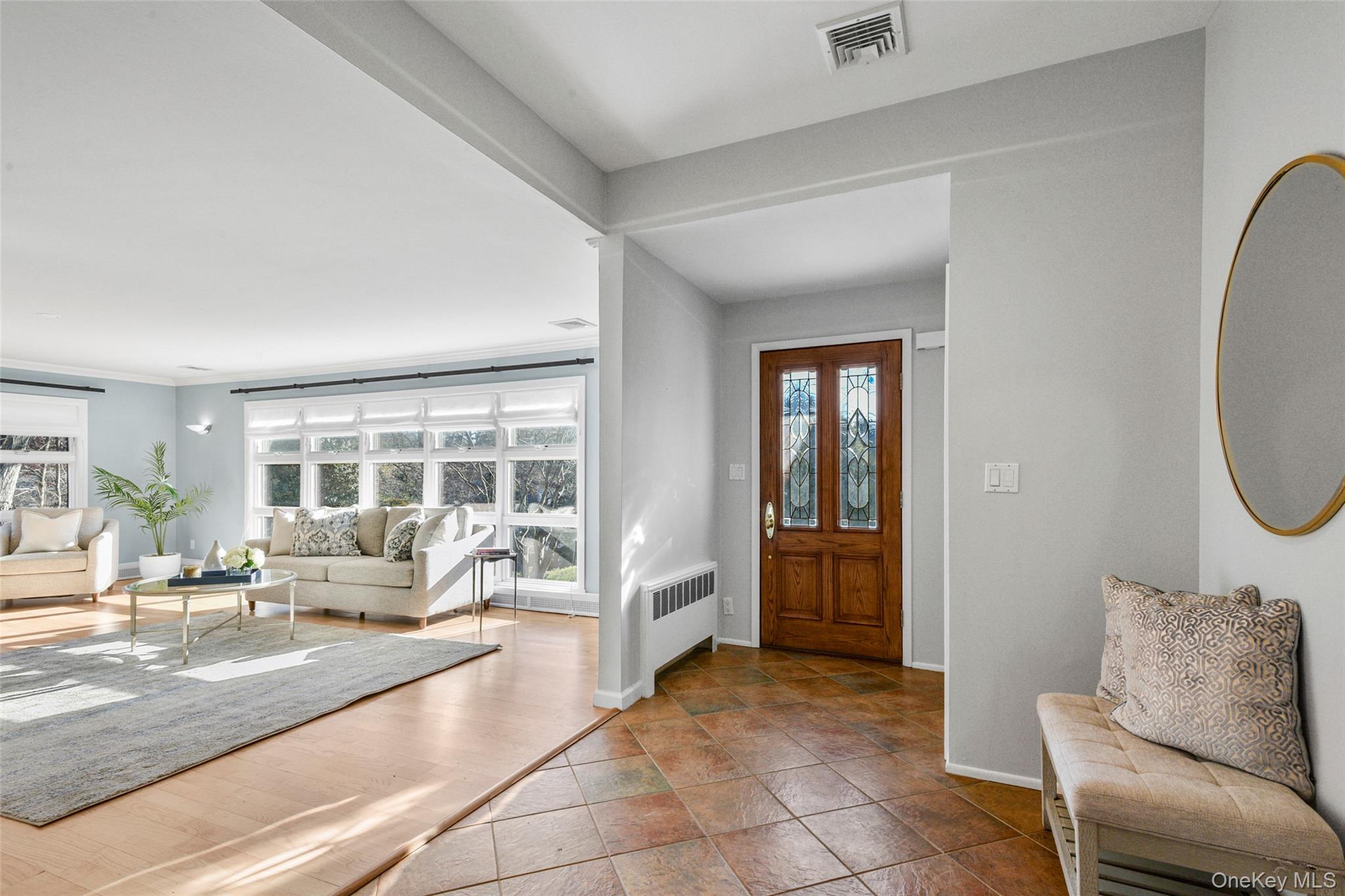 60 Overhill Road New Rochelle, NY 10804 - Photo 6 of 50 a living room with furniture and a large window