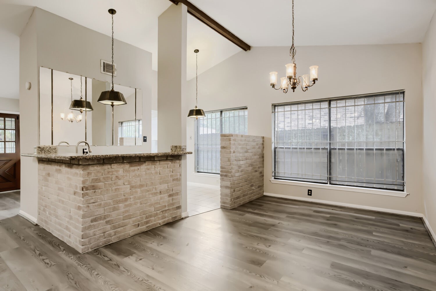 10103 Inwood Shadows Street Houston, TX 77088 - Photo 6 of 32 a view of a kitchen with a sink and refrigerator