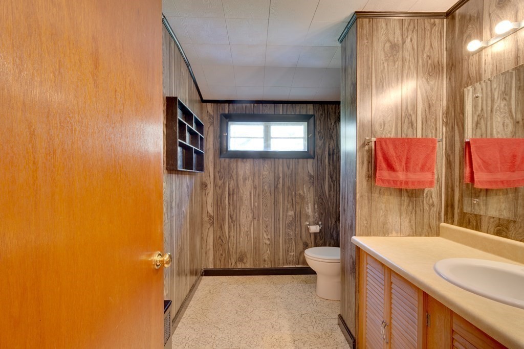 23 Fairmeadow Road Wilmington, MA 01887 - Photo 18 of 24 a bathroom with a sink and a mirror
