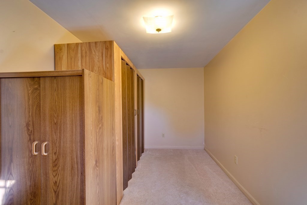 23 Fairmeadow Road Wilmington, MA 01887 - Photo 19 of 24 a view of a refrigerator in a room