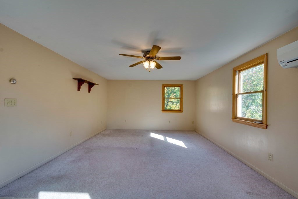 23 Fairmeadow Road Wilmington, MA 01887 - Photo 20 of 24 a view of an empty room with a window