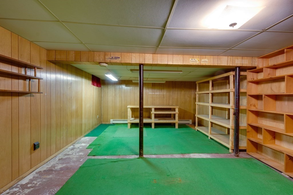 23 Fairmeadow Road Wilmington, MA 01887 - Photo 22 of 24 a view of a backyard with a small cabin