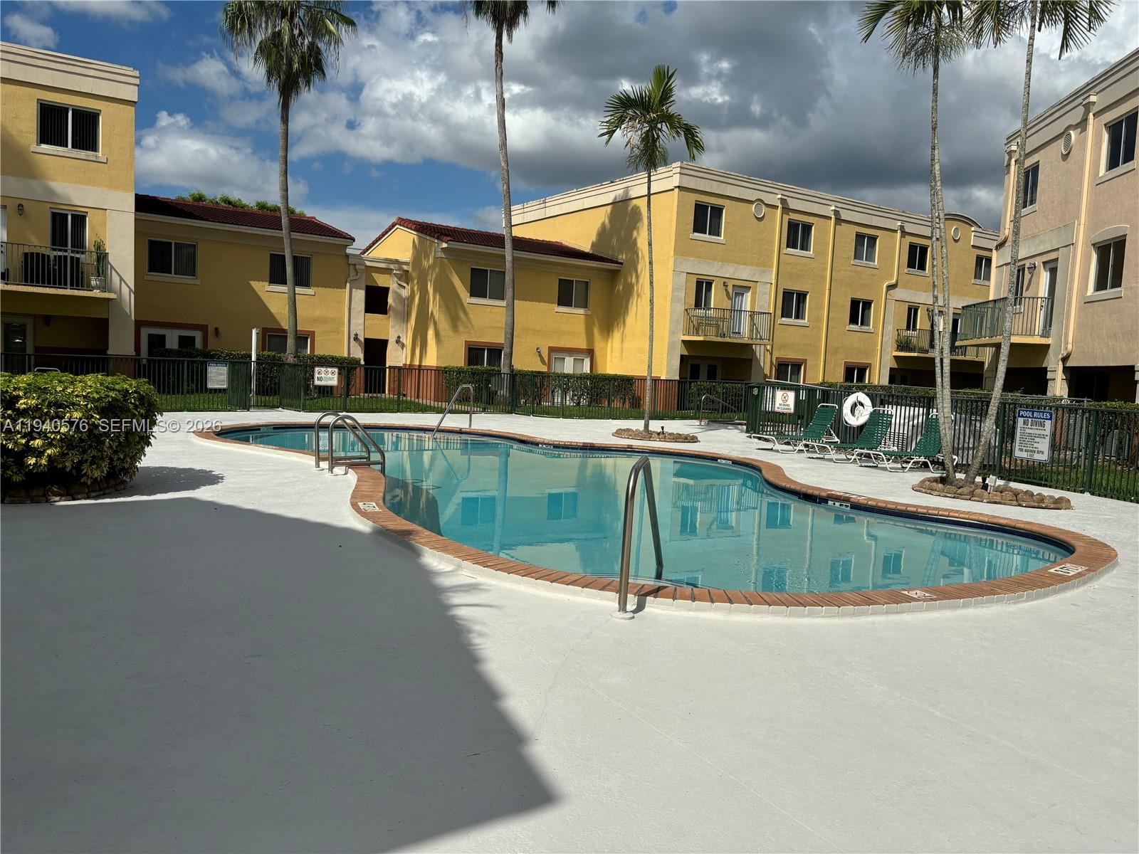 12645 Southwest 91st Street, Unit 2014 Miami, FL 33186 - Photo 14 of 15 a house view with a outdoor space