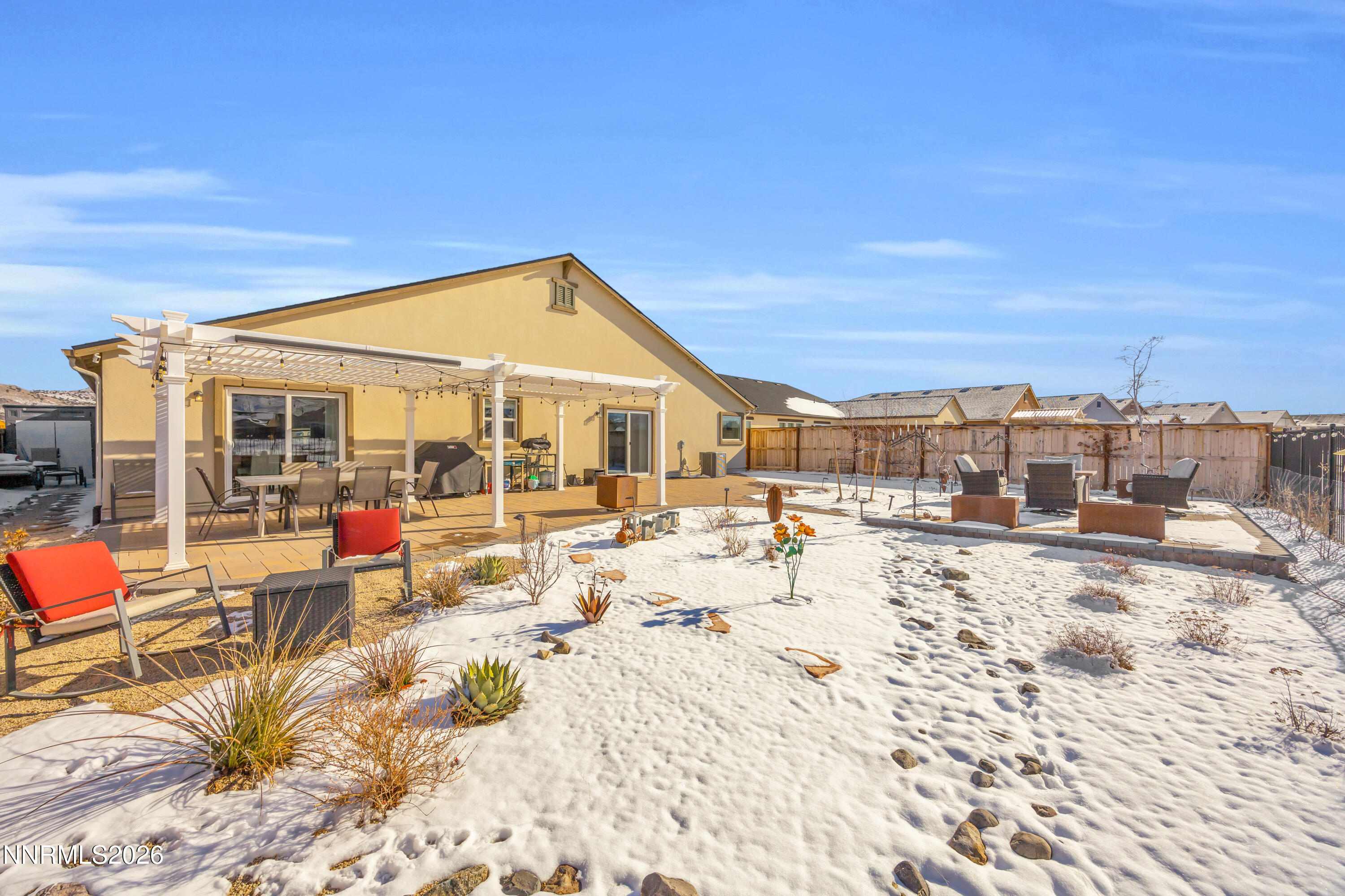7445 Hundred Acre Drive Reno, NV 89506 - Photo 29 of 41 a view of a terrace with wooden floor and seating