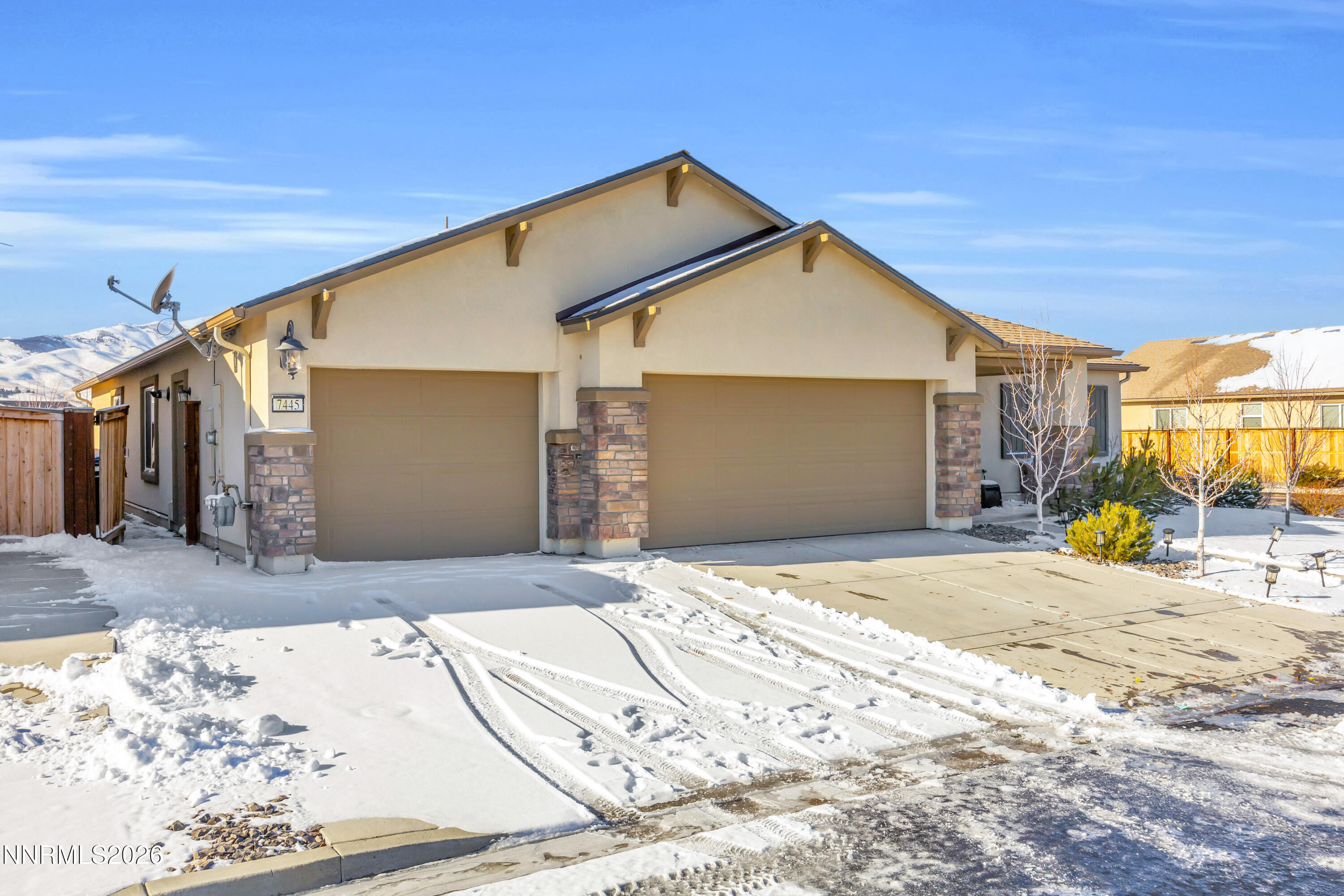 7445 Hundred Acre Drive Reno, NV 89506 - Photo 37 of 41 a bedroom with a bed and a window