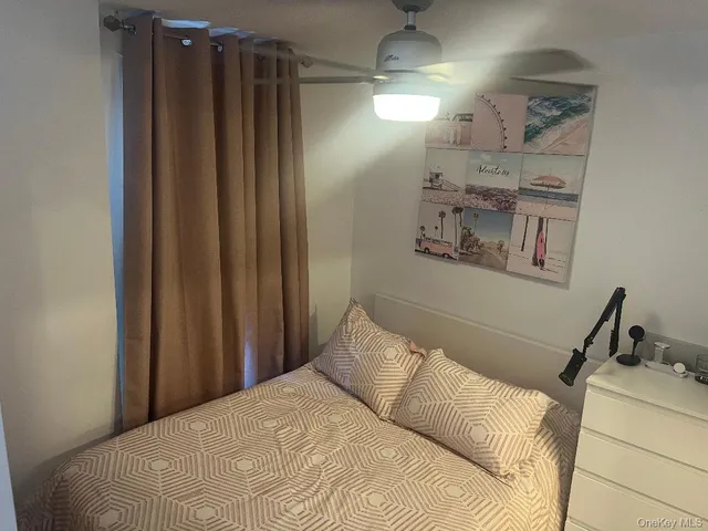 a bathroom with a sink toilet and a mirror