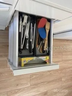 a view of storage and utility room with washer and dryer