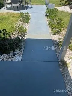 a view of a garden with patio