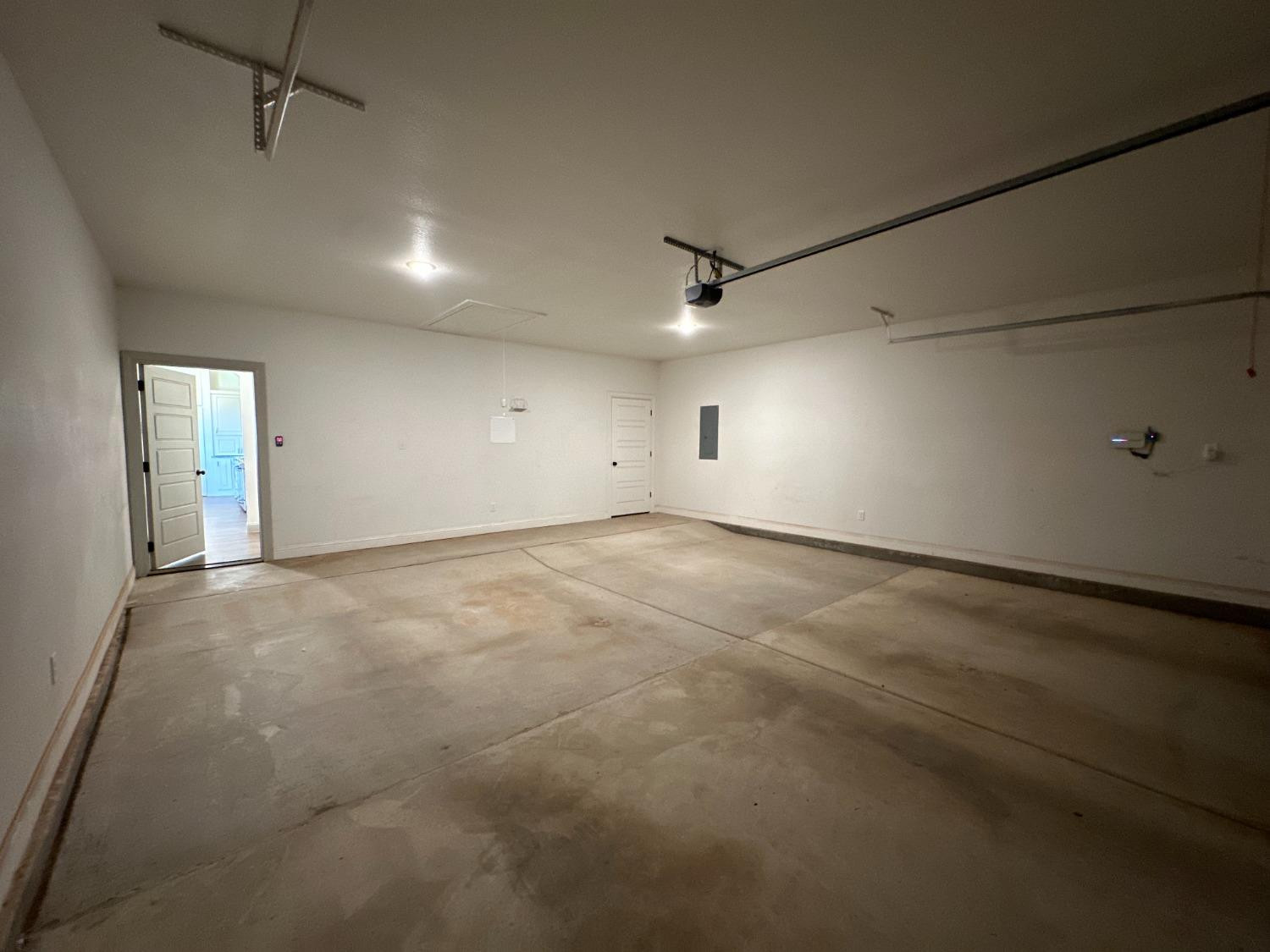 6959 103rd Street Lubbock, TX 79424 - Photo 43 of 49 an empty room with a empty space and windows
