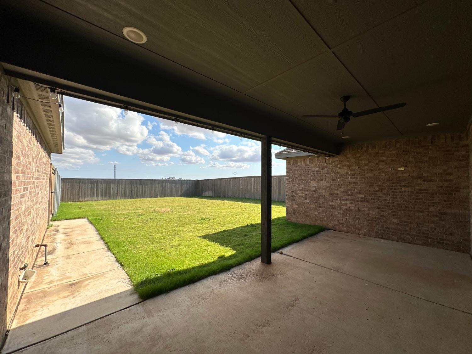 6959 103rd Street Lubbock, TX 79424 - Photo 44 of 49 a view of outdoor space with seating area