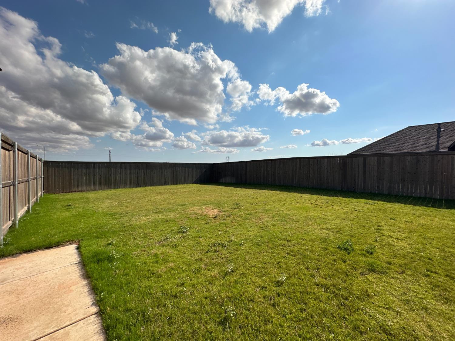 6959 103rd Street Lubbock, TX 79424 - Photo 45 of 49 a view of outdoor space and yard