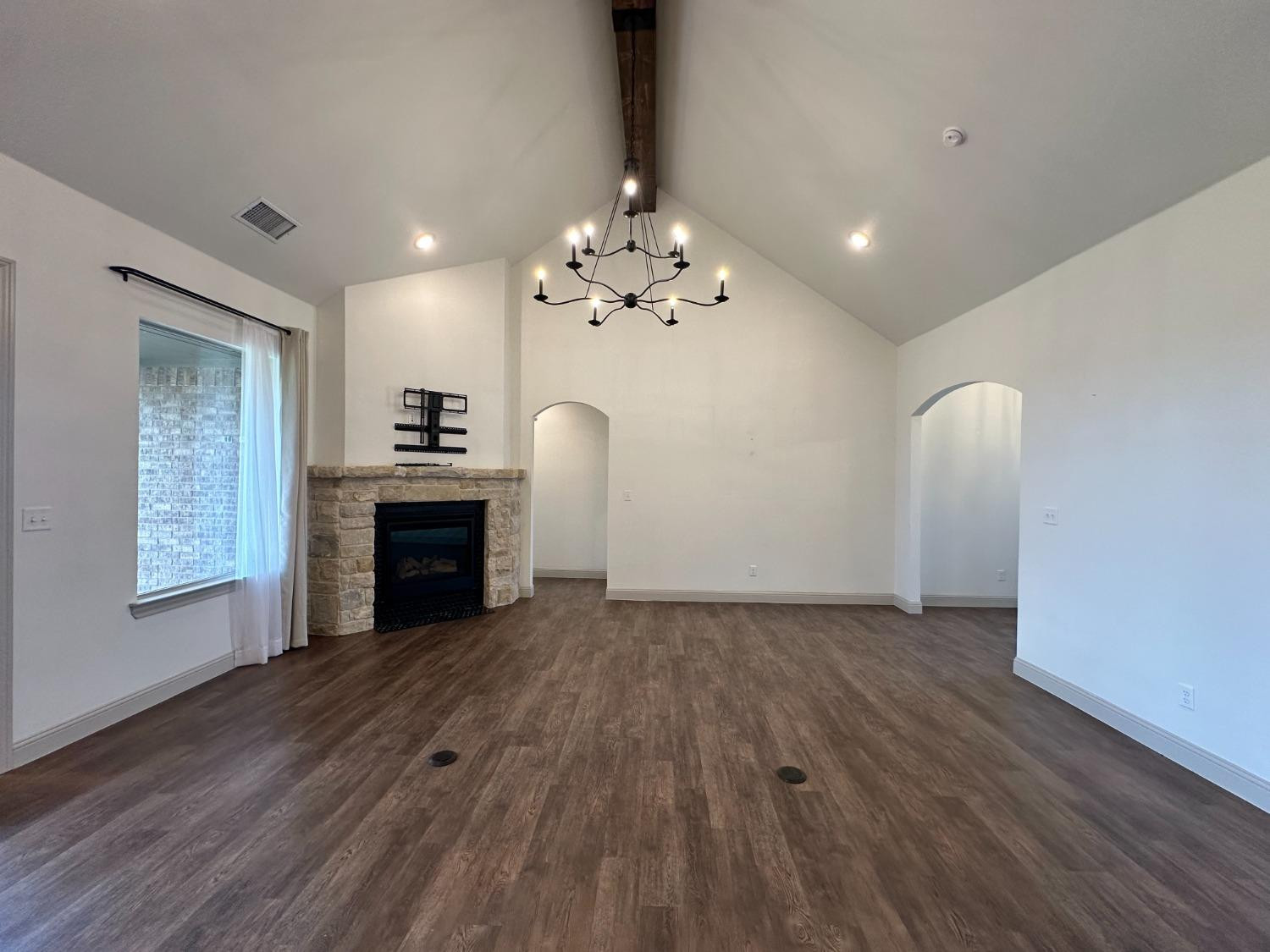 6959 103rd Street Lubbock, TX 79424 - Photo 10 of 49 a view of a livingroom with a fireplace