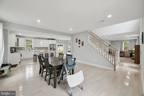 a view of a living room and dining room