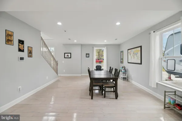 a bedroom with bed and a window