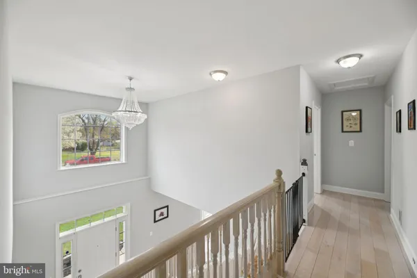 a bathroom with a sink toilet vanity and shower