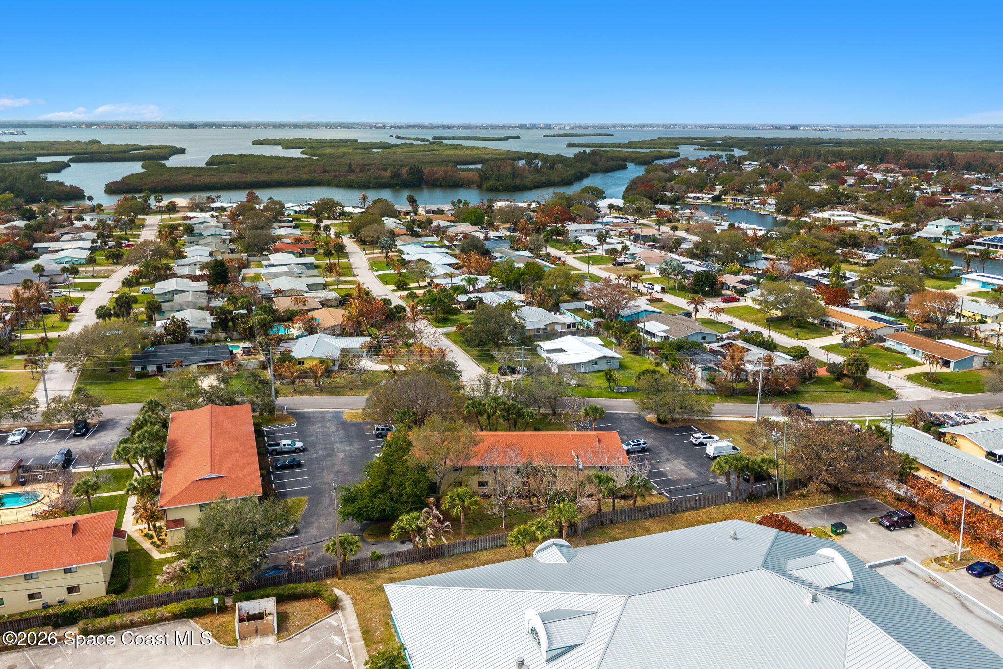 500 Catalina Road, Unit 402 Cocoa Beach, FL 32931 - Photo 29 of 34 an aerial view of residential building with ocean view