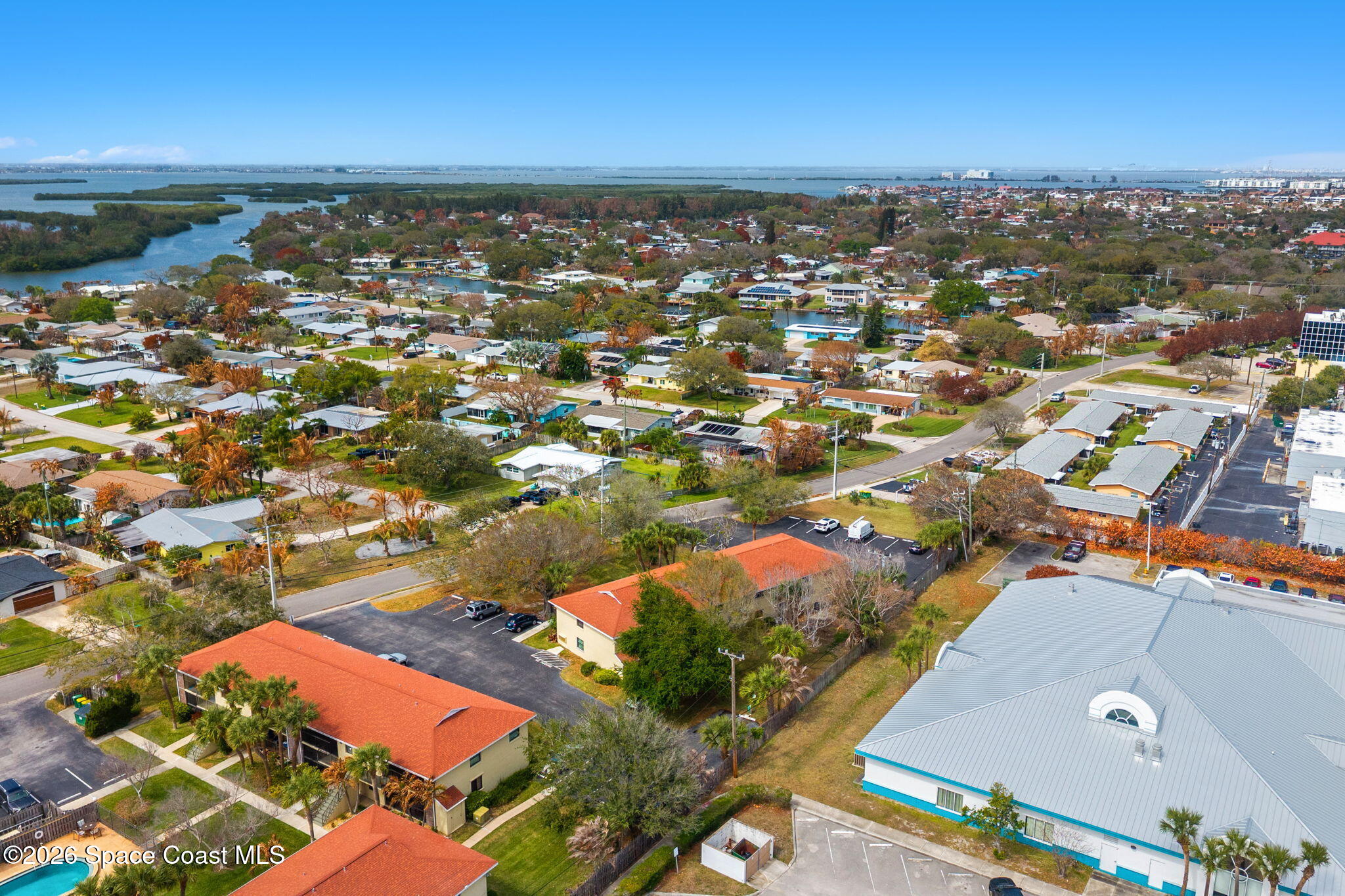 500 Catalina Road, Unit 402 Cocoa Beach, FL 32931 - Photo 30 of 34 an aerial view of residential houses with outdoor space