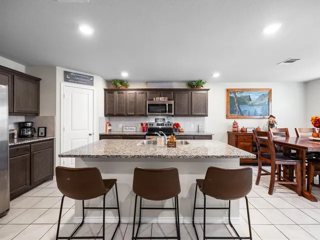a kitchen with sink cabinets and counter space