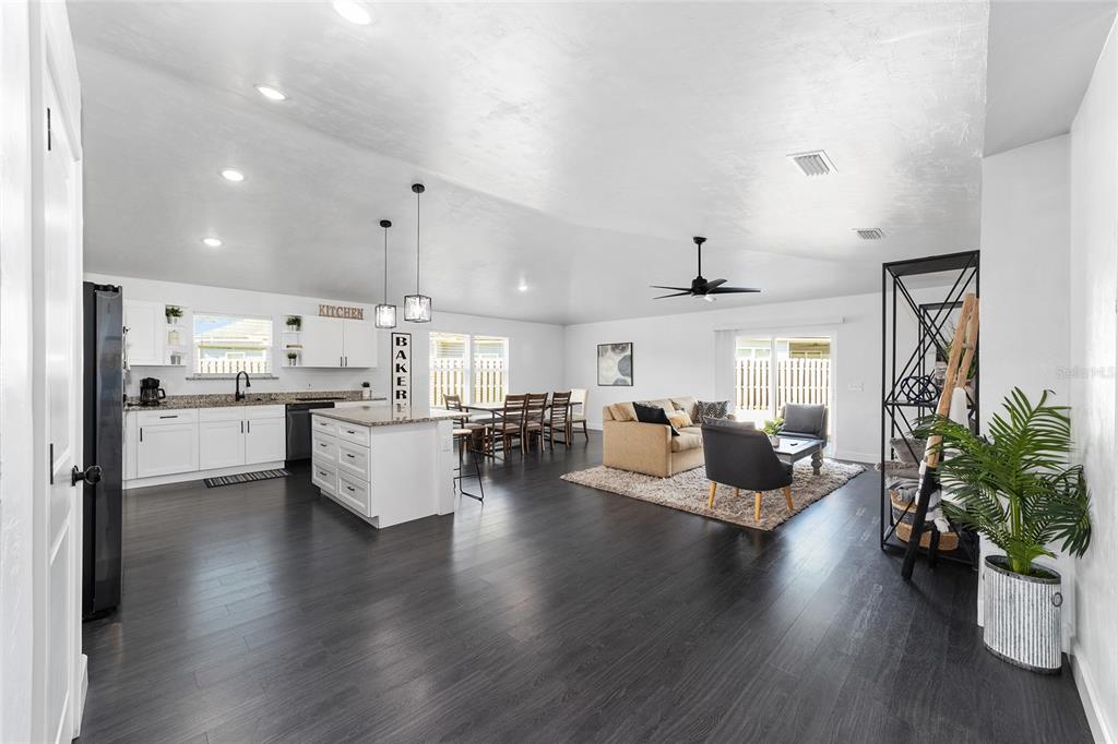 16668 Northwest 191st Way High Springs, FL 32643 - Photo 15 of 38 a living room with furniture and a large window